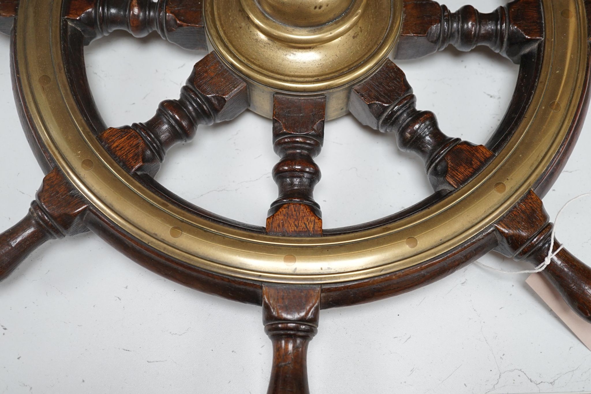 A 19th century mahogany and brass mounted ship's wheel, 60cm